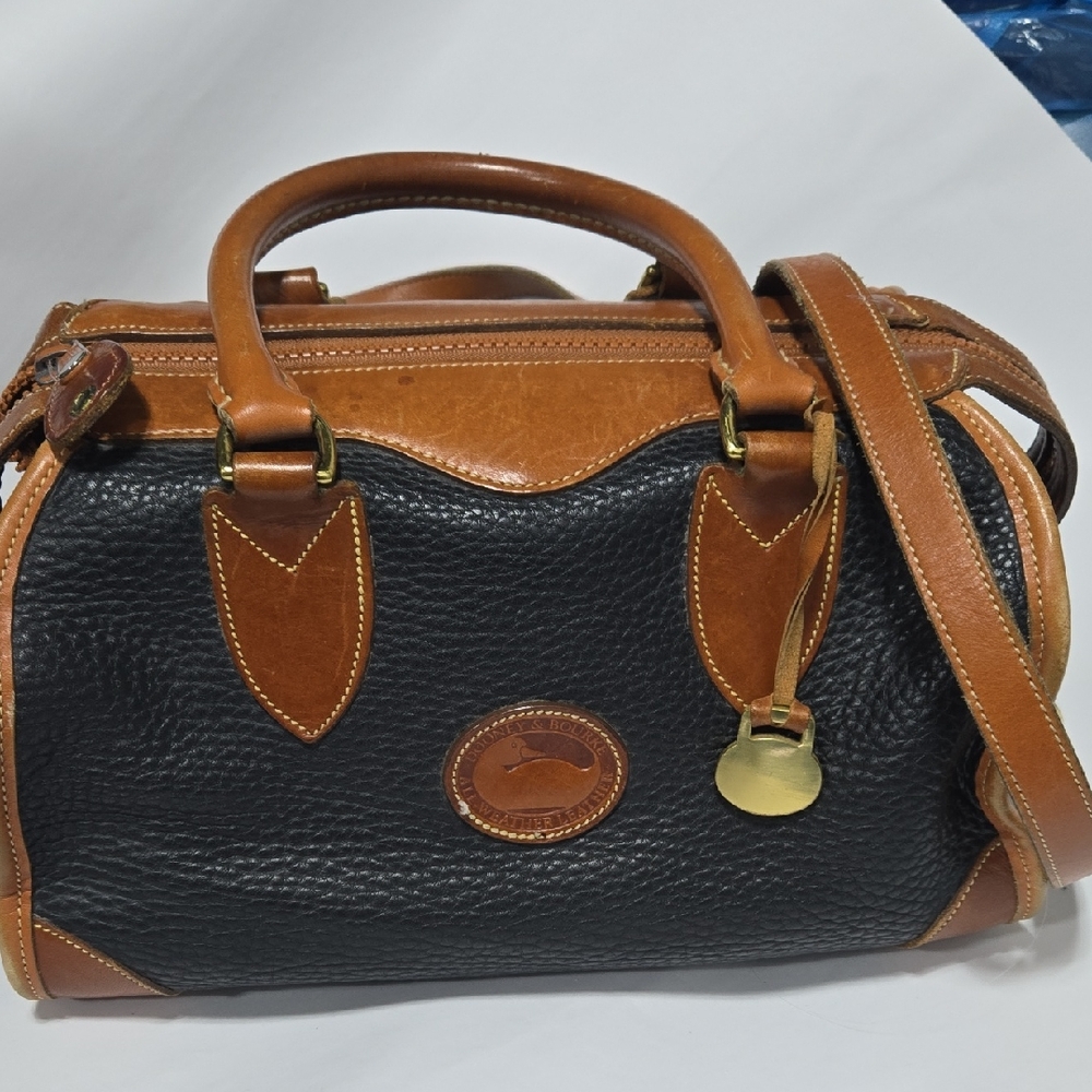 Dooney & Bourke Black and Tan Gladstone Duffel Bag